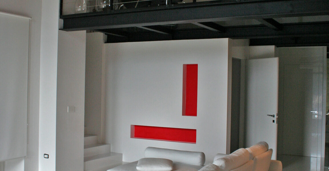 soggiorno minimal con camino centrale sospeso